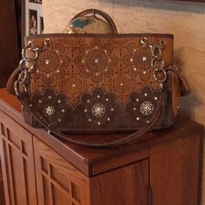 Montana West never been used leather purse.